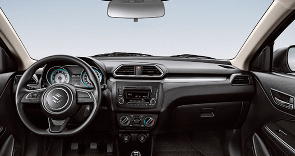 Tablero del Suzuki New Dzire con volante negro, instrumentos digitales y radio central